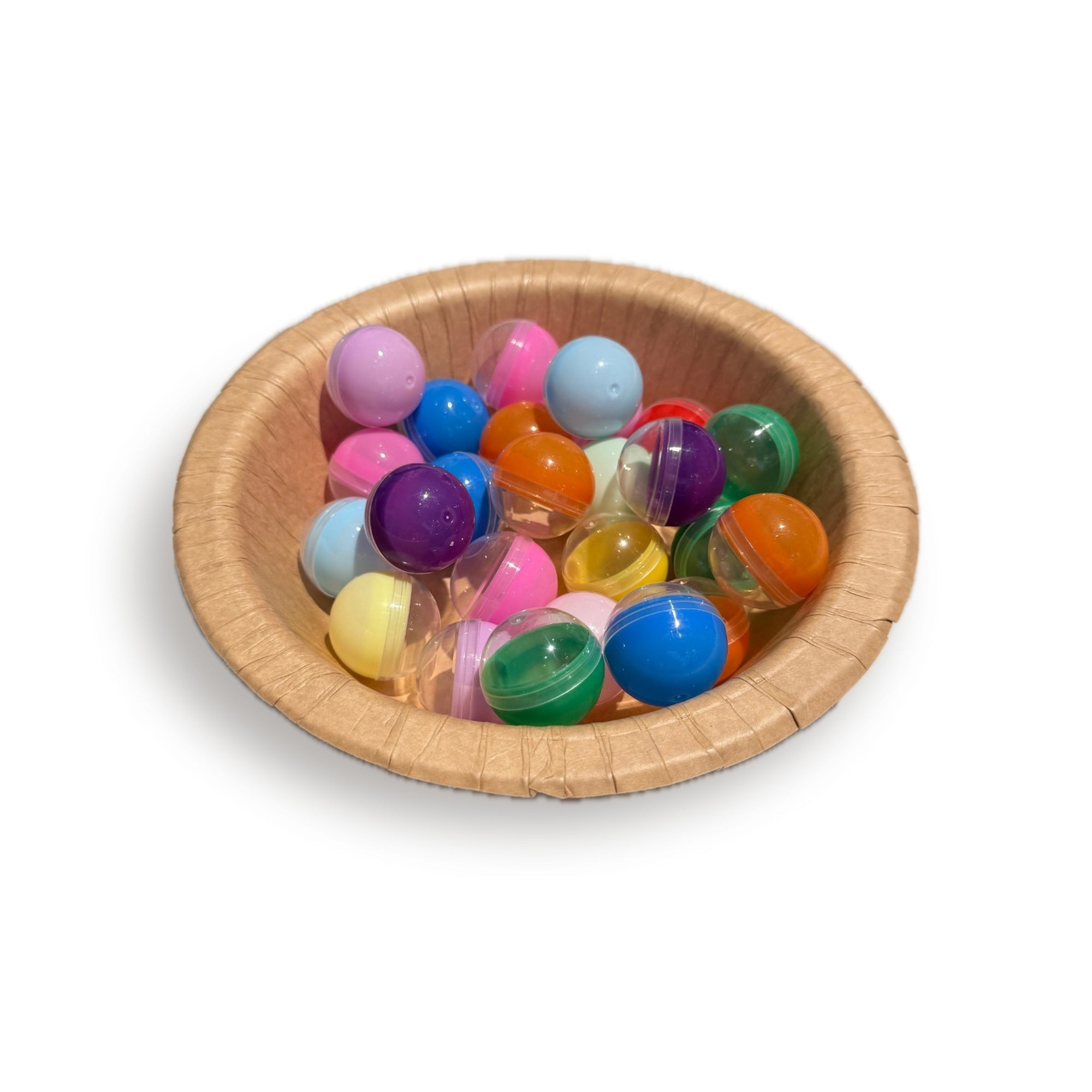 Befüllbare Kugeln bunt, 28 mm, im Pappteller schräg von der Seite